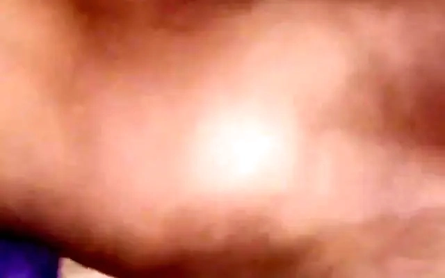 Desi whore sucks and licks her dark toes after showering them with her piss
